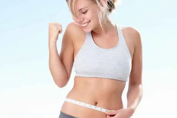 woman happy after fat reduction treatment Wanstead