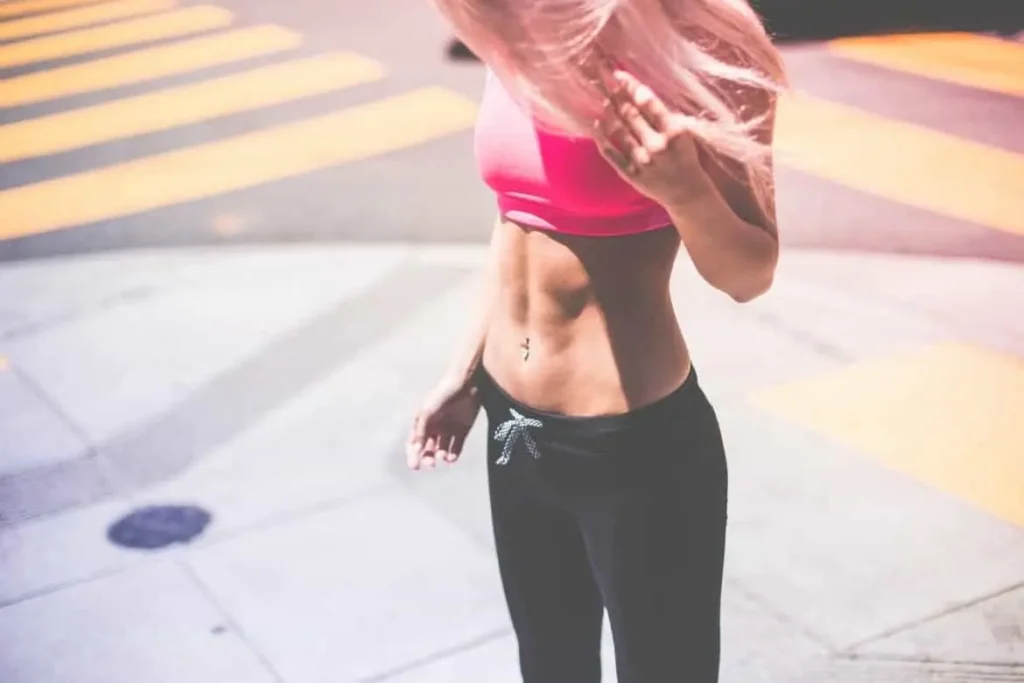 Woman with toned stomach after LA-EMS Body Sculpting Treatment Wanstead